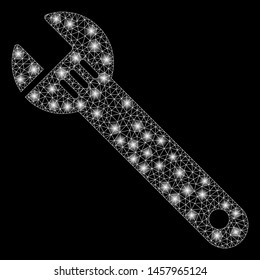 Glossy mesh spanner with glow effect. Abstract illuminated model of spanner icon. Shiny wire carcass polygonal mesh spanner. Vector abstraction on a black background.