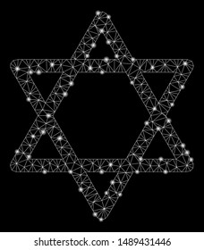 Glossy mesh star of David with glare effect. Abstract illuminated model of star of David icon. Shiny wire carcass polygonal mesh star of David. Vector abstraction on a black background.