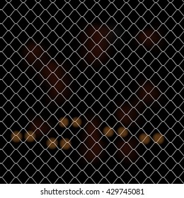 Glossy metal Rabitz net fence with cars head lights in the night background pattern