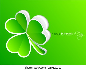 Glossy paper cut out Irish shamrock leaf on green background for Happy St. Patrick's Day celebration.