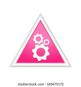 The glossy pink triangle gear icon / the setup icon / the machinery symbol