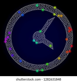 Glossy polygonal mesh clock icon with glow effect on a dark background. Carcass clock iconic vector with glitter multi colored points in spectrum colors. Abstract white mesh lines,