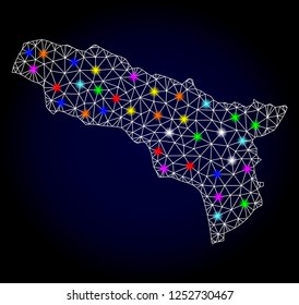 Glossy polygonal mesh map of Abkhazia with glare effect. Vector carcass map of Abkhazia with glowing multi colored dots for Christmas purposes. White mesh lines. Dark blue background.