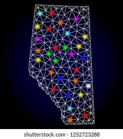 Glossy polygonal mesh map of Alberta Province with glare effect. Vector carcass map of Alberta Province with glowing multi colored spheres for New Year purposes. White mesh lines.