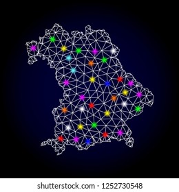 Glossy polygonal mesh map of Bavaria State with glare effect. Vector carcass map of Bavaria State with glowing multi colored points for New Year illustrations. White mesh lines. Dark blue background.