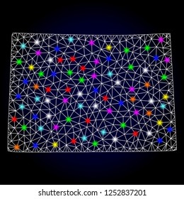 Glossy polygonal mesh map of Colorado State with glow effect. Vector carcass map of Colorado State with glowing multi colored spheres for New Year purposes. White mesh lines. Dark blue background.