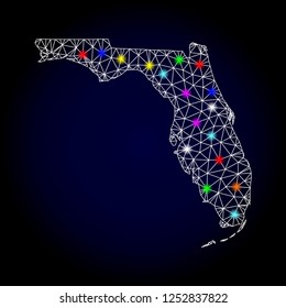 Glossy Polygonal Mesh Map Of Florida State With Glare Effect. Vector Carcass Map Of Florida State With Glowing Multicolored Points For Christmas Illustrations. White Mesh Lines. Dark Blue Background.