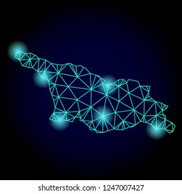 Glossy polygonal mesh map of Georgia country with glare effect. Abstract mesh lines, triangles, light spots and points on dark background with map of Georgia country.