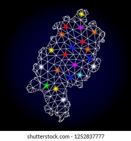 Glossy polygonal mesh map of Hesse State with glow effect. Vector carcass map of Hesse State with glowing multi colored points for New Year illustrations. White mesh lines. Dark blue background.