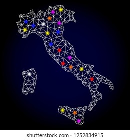Glossy polygonal mesh map of Italy with glow effect. Vector carcass map of Italy with glowing colorful dots for New Year templates. White mesh lines. Dark blue background. Constellation effect.