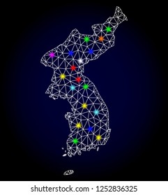 Glossy polygonal mesh map of Korea with glare effect. Vector carcass map of Korea with glowing multicolored dots for New Year purposes. White mesh lines. Dark blue background. Constellation effect.