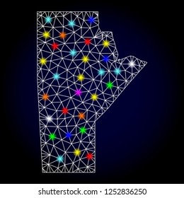 Glossy polygonal mesh map of Manitoba Province with glare effect. Vector carcass map of Manitoba Province with glowing multi colored spheres for Christmas posters. White mesh lines.