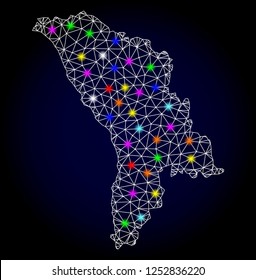 Glossy polygonal mesh map of Moldova with glow effect. Vector carcass map of Moldova with glowing multi colored spheres for Christmas templates. White mesh lines. Dark blue background.
