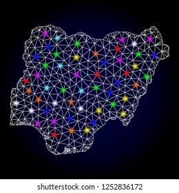 Glossy polygonal mesh map of Nigeria with glow effect. Vector carcass map of Nigeria with glowing multicolored dots for New Year posters. White mesh lines. Dark blue background. Constellation effect.