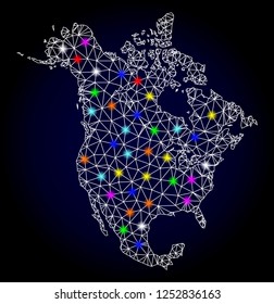 Glossy polygonal mesh map of North America with glare effect. Vector carcass map of North America with glowing multi colored points for New Year purposes. White mesh lines. Dark blue background.