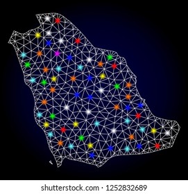 Glossy polygonal mesh map of Saudi Arabia with glow effect. Vector carcass map of Saudi Arabia with glowing multicolored dots for Christmas illustrations. White mesh lines. Dark blue background.