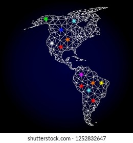 Glossy polygonal mesh map of South and North America with glow effect. Vector carcass map of South and North America with glowing multicolored dots for New Year illustrations. White mesh lines.