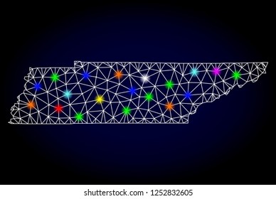 Glossy polygonal mesh map of Tennessee State with glow effect. Vector carcass map of Tennessee State with glowing colorful points for New Year illustrations. White mesh lines. Dark blue background.