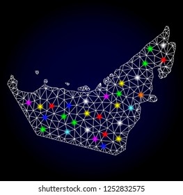 Glossy polygonal mesh map of United Arab Emirates with glow effect. Vector carcass map of United Arab Emirates with glowing colorful dots for New Year templates. White mesh lines.