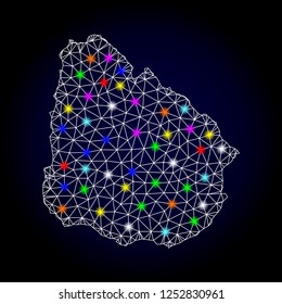 Glossy polygonal mesh map of Uruguay with glow effect. Vector carcass map of Uruguay with glowing multi colored spheres for New Year purposes. White mesh lines. Dark blue background.