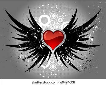 Glossy red heart on grunge wings background