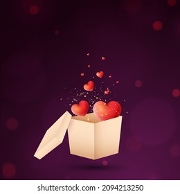 Glossy Red Hearts With Golden Particles Popping Out From 3D Box On Purple Bokeh Background.