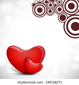 Glossy red hearts on creative abstract background. 