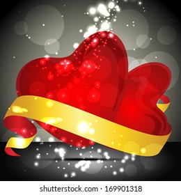 Glossy red hearts wrapped with golden ribbon on gray  background, Love Concept.