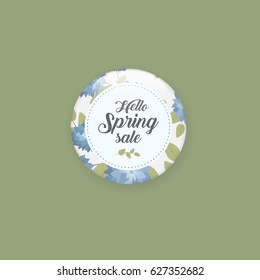 Glossy sale button or badge. Product promotions. Big sale, special offer, hello spring. Spring tag design, voucher template. Floral frame for text, isolated on white background