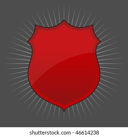 Glossy shield emblem over a gray background. Vector image.