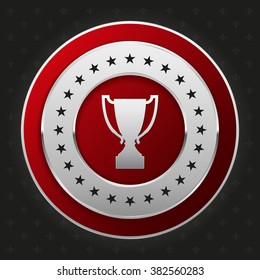 Glossy silver badge on black background
