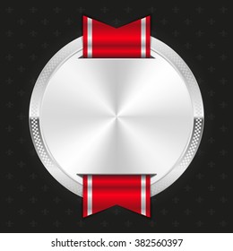 Glossy silver badge on black background
