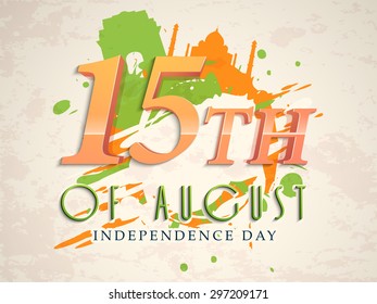 Glossy text 15th of August on famous monuments and flag color splash grungy background for Indian Independence Day celebration.