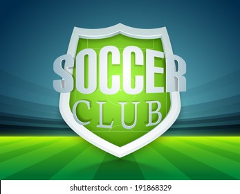 Glossy trophy for soccer ball winner with stylish text soccer club on stadium background. 