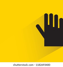 glove with drop shadow in yellow background