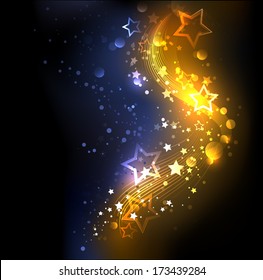 Glowing, abstract, golden with blue background, decorated with stars.