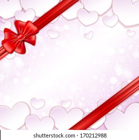 Glowing background with paper hearts, bow, ribbons and empty space for your text