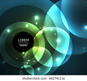 Glowing blue shiny overlapping circles composition on dark background, magic style light effects abstract design template