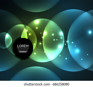Glowing blue shiny overlapping circles composition on dark background, magic style light effects abstract design template