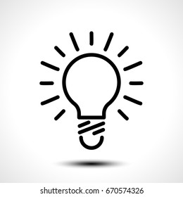 Glowing bulb icon on white background. Vector illustration