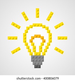 Glowing bulb from the plastic constructor. Ideas symbol design.