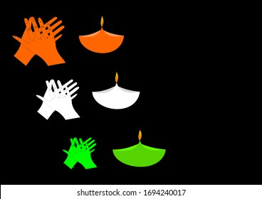 Glowing clay lamp light with clay lamp in Indian flag color around dark background. Representing the concept of gratitude towards people working to fight against COVID-19 in India.