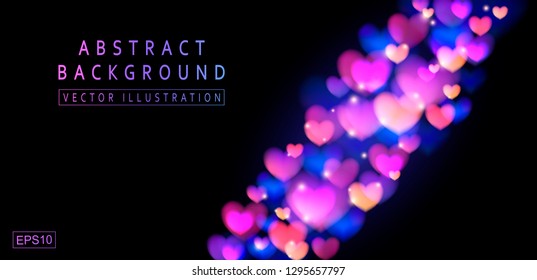 Glowing defocused hearts on a black background. Izolated bright bokeh effect.  Abstract festive background with multicolored lights