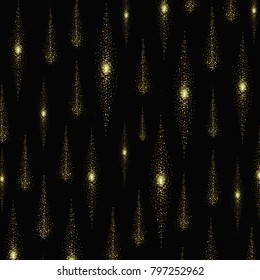 Glowing glitter light lines on black background Christmas decoration design element.. Shining glittering golden rain