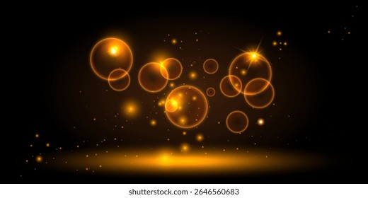 Glowing golden light bubbles and sparkles on a dark background. Radiant particles with shine, flares, and bokeh effect create a magical festive atmosphere.