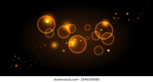 Glowing golden light bubbles and sparkles on a dark background. Radiant particles with shine, flares, and bokeh effect create a magical festive atmosphere.