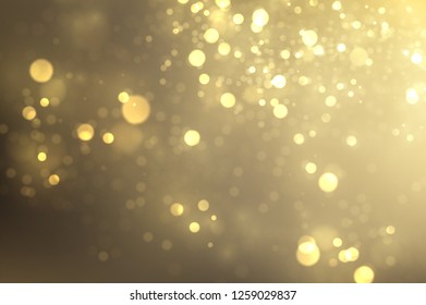 Glowing golden light effect. Sparkling particles explosion. Abstract gold bokeh magical background