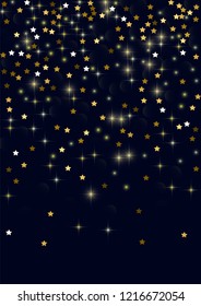 Glowing golden stars with twinkling elements on a blue background. Stars in the night sky. Gold glitter. Festive Christmas background.