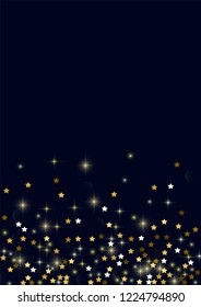 Glowing golden stars with twinkling elements on a blue background. Stars in the night sky. Gold glitter. Festive Christmas background.