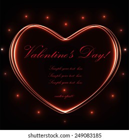 Glowing heart on black background